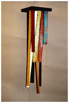 ©1994 Lisa Brugger Crowded - Wood Sculpture  36 tall X dia